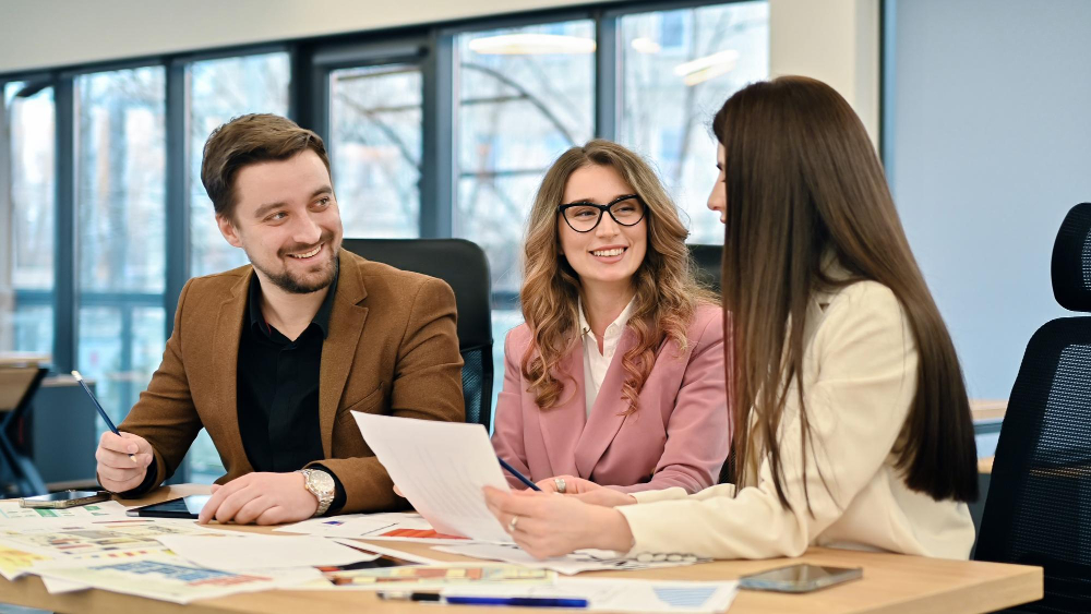 Business professionals reviewing documents together