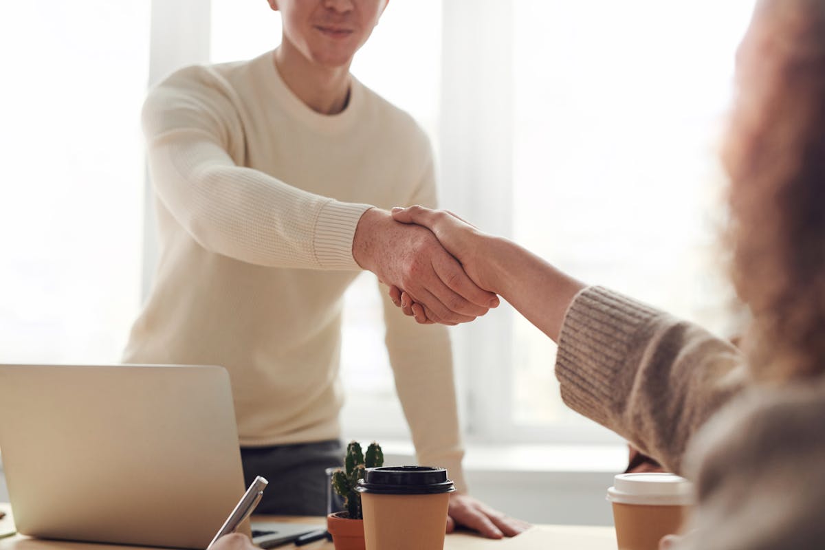 Business owner and advisor reviewing tax-related resources