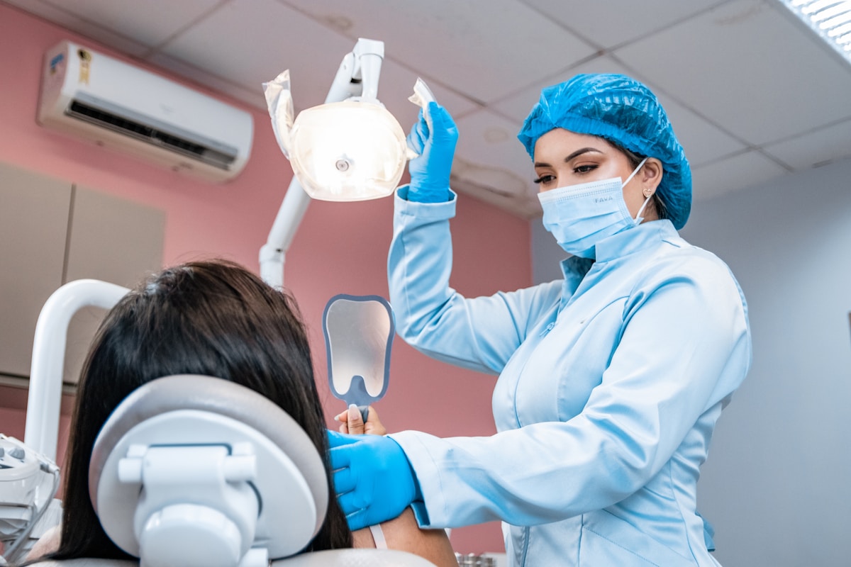 Dental professional preparing a patient consultation